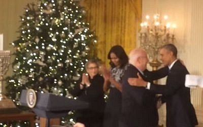 President Rivlin shakes hands, effusively, with President Obama at the White House Hanukkah lighting, December 9, 2015 (YouTube screenshot)