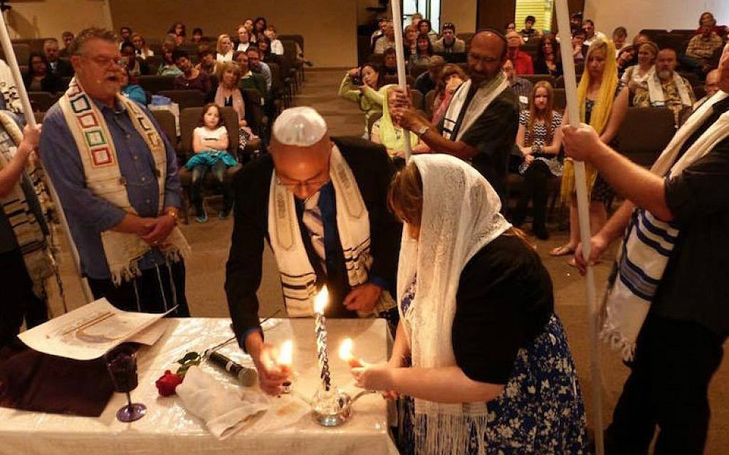 Nicholas Thalasinos renewing his marital vows with his wife at a Jewish-style ceremony, 2013 (Facebook/JTA) Nicholas Thalasinos renewing his marital vows with his wife at a Jewish-style ceremony, 2013 (Facebook/JTA)