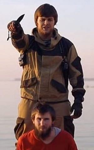 An Islamic State video shows the execution of an alleged Russian spy (YouTube screen capture)