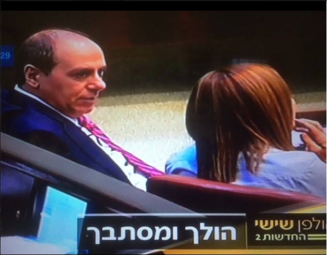 Interior Minister Silvan Shalom speaks to Zionist Union MK Shelly Yachimovich in the Knesset plenum. The picture was shared by Yachimovich in a Facebook post in which she called on the minister to suspend himself, posted on December 19 2015. (Screen capture Facebook) Interior Minister Silvan Shalom speaks to Zionist Union MK Shelly Yachimovich in the Knesset plenum. The picture was shared by Yachimovich in a Facebook post in which she called on the minister to suspend himself, posted on December 19 2015. (Screen capture Facebook)