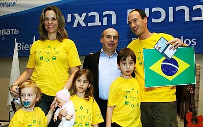 The Teitelbaum family is welcomed to Israel by Jewish Agency Chairman Natan Sharansky in 2010. (Courtesy of Teitelbaum family)