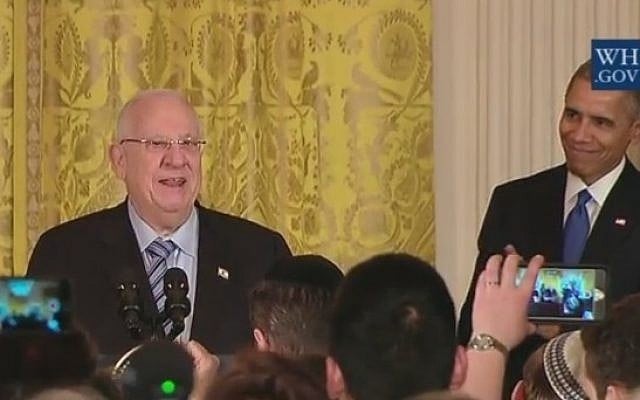 President Reuven Rivlin joins Barack Obama at a Hanukkah candle-lighting ceremony at the White House on December 9, 2015 (screen capture: YouTube) President Reuven Rivlin joins Barack Obama at a Hanukkah candle-lighting ceremony at the White House on December 9, 2015 (screen capture: YouTube)