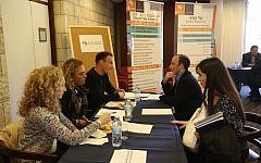 Israeli academics teaching abroad discuss job prospects in Israel at an event sponsored by the Israel Academy of Sciences and Humanities (Courtesy)