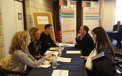 Israeli academics teaching abroad discuss job prospects in Israel at an event sponsored by the Israel Academy of Sciences and Humanities (Courtesy)