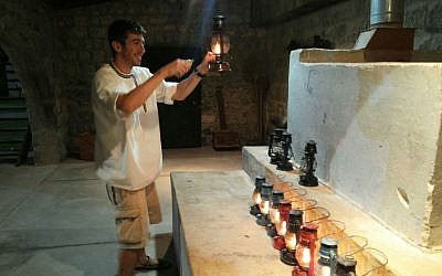 An oil-lamp tour at the Tel Hai Museum (courtesy)