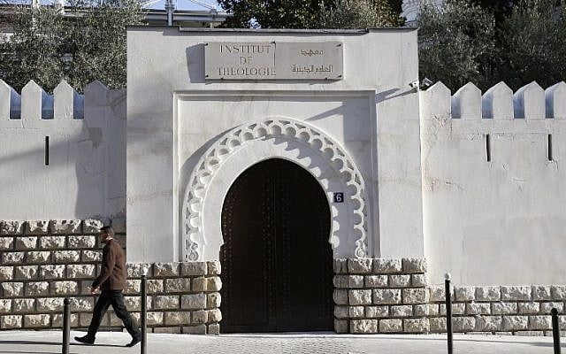 A file photo taken on December 19, 2015 shows a man passing by the entrance to the Al-Ghazali theology institute of the Grand Mosque of Paris.
(AFP/PATRICK KOVARIK) A file photo taken on December 19, 2015 shows a man passing by the entrance to the Al-Ghazali theology institute of the Grand Mosque of Paris.
(AFP/PATRICK KOVARIK)