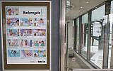 A poster informs about pool rules in a public swimming pool in Munich, southern Germany, on January 12, 2016. (Sven Hoppe/DPA/AFP)