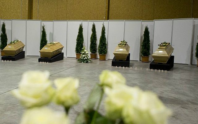 Coffins with the remains of ten German tourists killed in a suicide bomb attack at Istanbul's historic Sultanahmet district are laid out in a hangar at Berlin's Tegel Airport after they were repatriated on January 16, 2016. (Axel Schmidt/Pool/AFP) Coffins with the remains of ten German tourists killed in a suicide bomb attack at Istanbul's historic Sultanahmet district are laid out in a hangar at Berlin's Tegel Airport after they were repatriated on January 16, 2016. (Axel Schmidt/Pool/AFP)