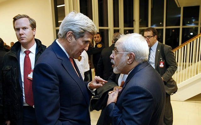 Then-US Secretary of State John Kerry (left) speaks with Iranian Foreign Minister Mohammad Javad Zarif in Vienna, Austria, on January 16, 2016. (AFP/Kevin Lamarque/Pool) Then-US Secretary of State John Kerry (left) speaks with Iranian Foreign Minister Mohammad Javad Zarif in Vienna, Austria, on January 16, 2016. (AFP/Kevin Lamarque/Pool)