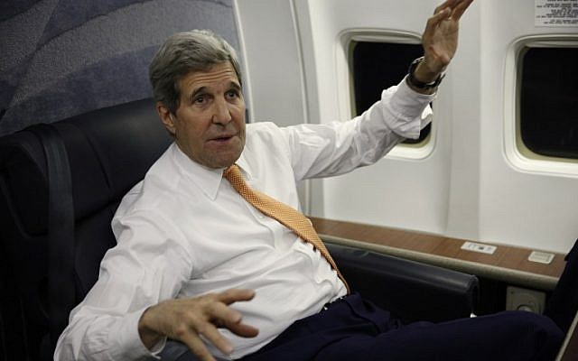 US Secretary of State John Kerry speaks to journalists about his negotiations with Iran upon his arrival from Vienna at Joint Base Andrews in Washington on January 17, 2016. (AFP / POOL / KEVIN LAMARQUE)