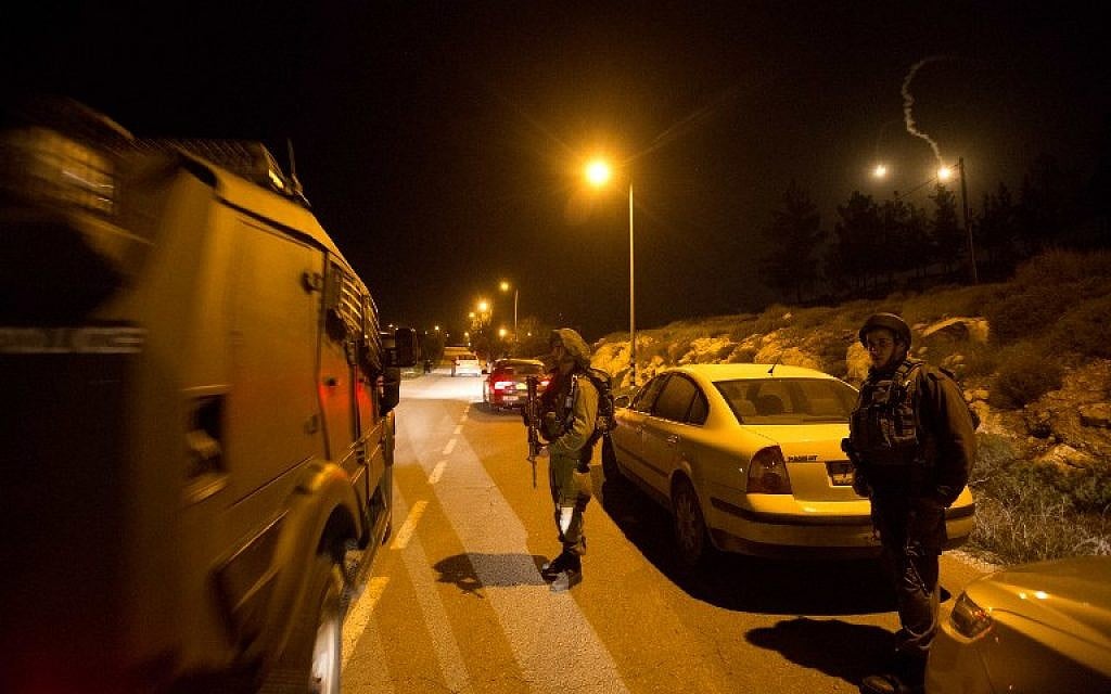 Illustrative photo of IDF soldiers in the West Bank on January 17, 2016 (AFP/Menahem Kahana)