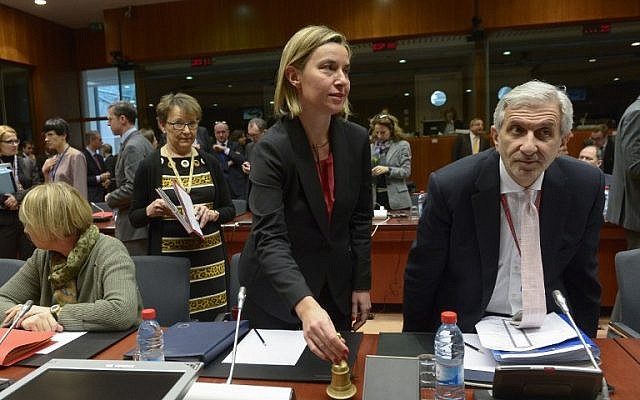 EU Foreign Affairs chief Federica Mogherini, center, rings the bell during a EU Foreign Affairs Council meeting at EU headquarters in Brussels, on January 18, 2016. (AFP/John Thys) EU Foreign Affairs chief Federica Mogherini, center, rings the bell during a EU Foreign Affairs Council meeting at EU headquarters in Brussels, on January 18, 2016. (AFP/John Thys)
