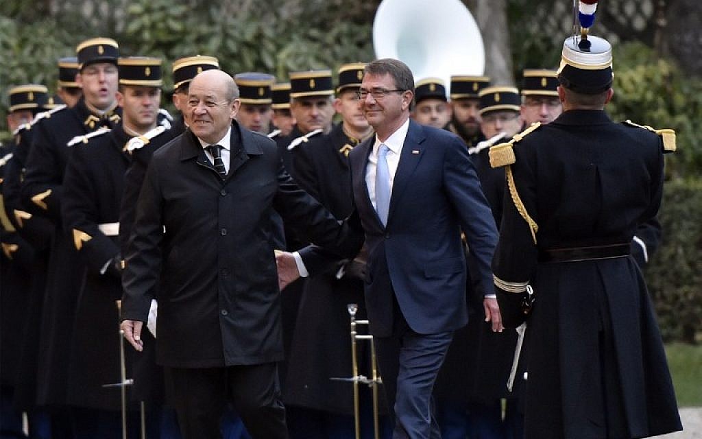 French Defense minister Jean-Yves Le Drian, left, welcomes US defense secretary Ashton Carter before a meeting with their British, Dutch, Australian, Italian and German counterparts to discuss the fight against the Islamic State group, on January 20, 2016, in Paris. (AFP/ALAIN JOCARD) French Defense minister Jean-Yves Le Drian, left, welcomes US defense secretary Ashton Carter before a meeting with their British, Dutch, Australian, Italian and German counterparts to discuss the fight against the Islamic State group, on January 20, 2016, in Paris. (AFP/ALAIN JOCARD)