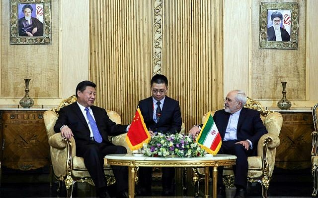 Iranian Foreign Minister Mohammad Javad Zarif (R) meets with Chinese President Xi Jinping (L) upon the latter's arrival in the Iranian capital Tehran, on January 22, 2016. (AFP/ISNA/MOHAMMAD REZA NADIMI) Iranian Foreign Minister Mohammad Javad Zarif (R) meets with Chinese President Xi Jinping (L) upon the latter's arrival in the Iranian capital Tehran, on January 22, 2016. (AFP/ISNA/MOHAMMAD REZA NADIMI)