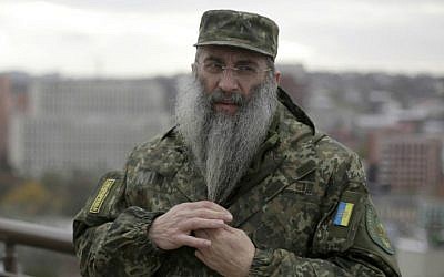 Asher Cherkasskiy standing on the roof of a Jewish center in Dnipropetrovsk, Ukraine, on November 11, 2015. (AFP/Anatoli Stepanov)