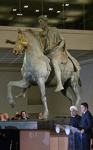 Iranian President Hassan Rouhani (2ndR) and Italian Prime Minister Matteo Renzi (R) hold a press conference at the Capitol Hill in Rome on January 25, 2016. (Tiziana Fabi/AFP)