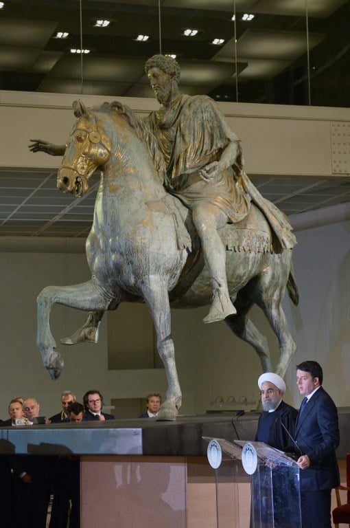 Iranian President Hassan Rouhani (2ndR) and Italian Prime Minister Matteo Renzi (R) hold a press conference at the Capitol Hill in Rome on January 25, 2016. (Tiziana Fabi/AFP) Iranian President Hassan Rouhani (2ndR) and Italian Prime Minister Matteo Renzi (R) hold a press conference at the Capitol Hill in Rome, next to the equestrian statue of Marcus Aurelius, on January 25, 2016. (Tiziana Fabi/AFP)