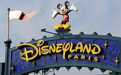This file photo taken on August 13, 2015 shows a sign above the entrance at Disneyland Paris in Marne-la-Vallee. (AFP / BERTRAND GUAY) This file photo taken on August 13, 2015 shows a sign above the entrance at Disneyland Paris in Marne-la-Vallee. (AFP / BERTRAND GUAY)