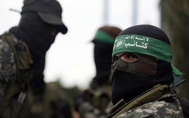 Hamas fighters attend a funeral procession in Gaza City on January 29, 2016, for seven members of the terror group killed when an attack tunnel into Israel collapsed. (AFP/Mohammed Abed) Hamas fighters attend a funeral procession in Gaza City on January 29, 2016, for seven members of the terror group killed when an attack tunnel into Israel collapsed. (AFP/Mohammed Abed)