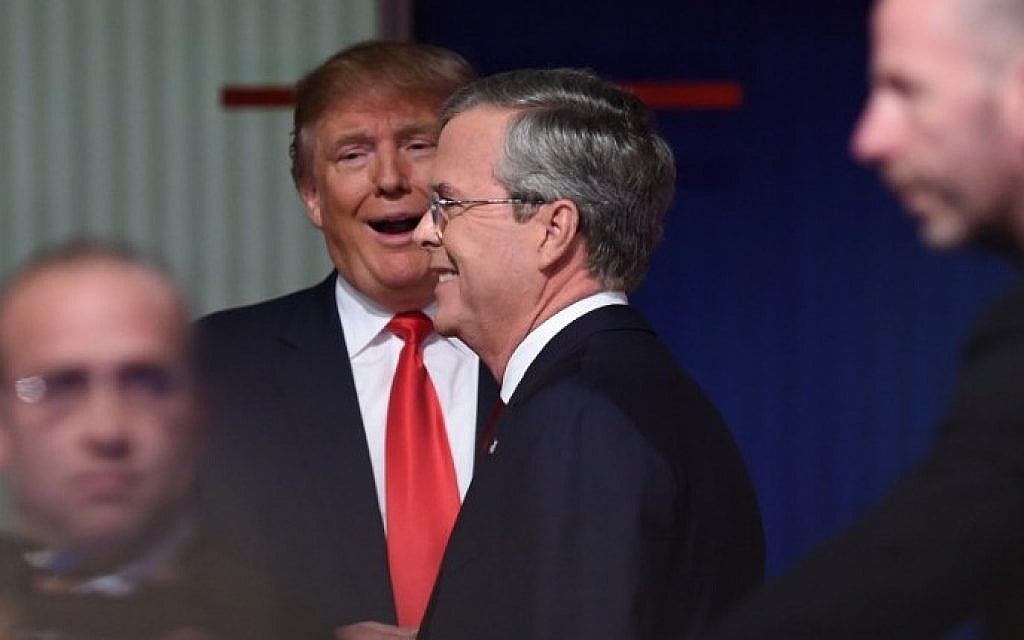 Republican presidential candidates businessman Donald Trump (2nd L) with former Florida Gov. Jeb Bush leaving the Republican presidential debate sponsored by Fox Business and the Republican National Committee at the North Charleston Coliseum and Performing Arts Center in Charleston, South Carolina on January 14, 2016. (Timothy A. Clary/AFP) Republican presidential candidates businessman Donald Trump (2nd L) with former Florida Gov. Jeb Bush leaving the Republican presidential debate sponsored by Fox Business and the Republican National Committee at the North Charleston Coliseum and Performing Arts Center in Charleston, South Carolina on January 14, 2016. (Timothy A. Clary/AFP)