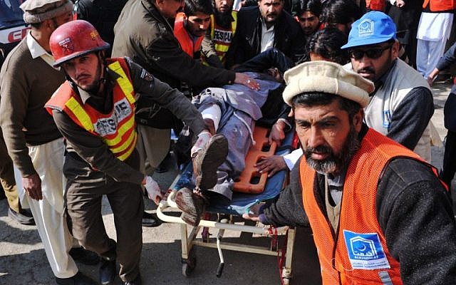 Illustrative: Pakistani rescuers shift an injured man to a hospital following an attack by gunmen in the Bacha Khan university in Charsadda, about 50 kilometers from Peshawar, on January 20, 2016. (AFP Photo/Hasham Ahmed) Illustrative: Pakistani rescuers shift an injured man to a hospital following an attack by gunmen in the Bacha Khan university in Charsadda, about 50 kilometers from Peshawar, on January 20, 2016. (AFP Photo/Hasham Ahmed)