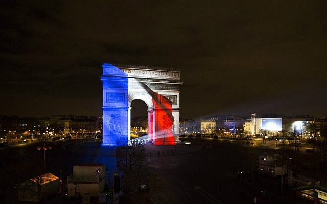Art work is projected on the Arc de Triomphe during a sound and light show as part of New Year's celebrations on the Champs-Elysees in Paris on January 1, 2016. (AFP Photo/Florian David) Art work is projected on the Arc de Triomphe during a sound and light show as part of New Year's celebrations on the Champs-Elysees in Paris on January 1, 2016. (AFP Photo/Florian David)