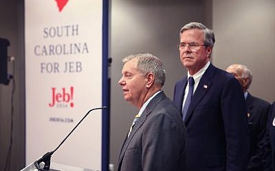 South Carolina Sen. Lindsey Graham (L) announces his endorsement of Jeb Bush for president on January 15, 2016 in North Charleston, South Carolina. Graham dropped his own bid for the presidency last month.   (Scott Olson/Getty Images/AFP)