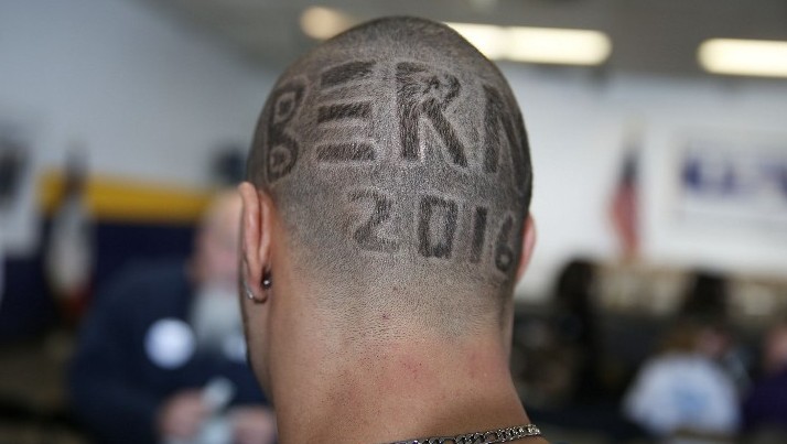 A man has Bernie 2016 cut into his hair at a campaign event on January 26, 2016 in Des Moines, Iowa (Joe Raedle/Getty Images/AFP)