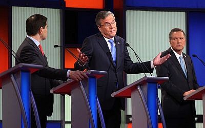 Republican presidential candidates (R-L) Ohio Governor John Kasich, Jeb Bush and Sen. Marco Rubio (R-FL) participate in the Fox News - Google GOP Debate in Des Moines, Iowa, on January 28, 2016. (Scott Olson/Getty Images/AFP)
