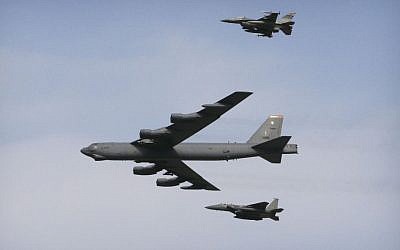A US Air Force B-52 bomber flies over Osan Air Base in Pyeongtaek, South Korea,  January 10, 2016. (AP Photo/Ahn Young-joon)