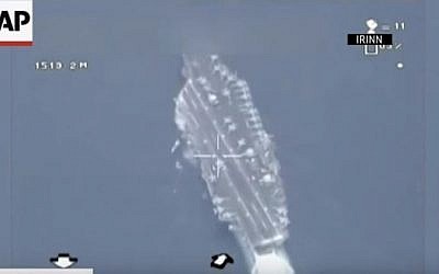 Footage alleged to be taken from an Iranian drone showing a US aircraft carrier in the Persian Gulf. (YouTube/Associated Press)