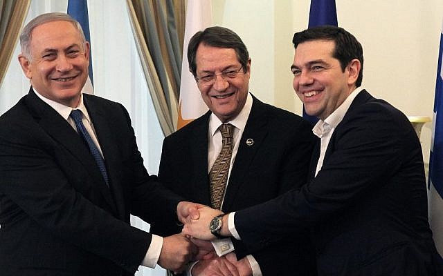 Prime Minister Benjamin Netanyahu, Cypriot President Nicos Anastasides, center and Greek Prime Minister Alexis Tsipras shake hands during a meeting at the presidential palace in the Cypriot capital, January 28, 2016. (Yiannis Kourtoglou, Pool Photo via AP) Prime Minister Benjamin Netanyahu, Cypriot President Nicos Anastasides, center and Greek Prime Minister Alexis Tsipras shake hands during a meeting at the presidential palace in the Cypriot capital, January 28, 2016. (Yiannis Kourtoglou, Pool Photo via AP)