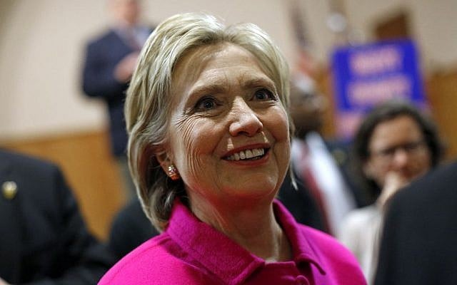 Democratic presidential candidate Hillary Clinton greets attendees after speaking at the Scott County Democrats Red, White and Blue Banquet in Davenport, Iowa, Saturday, Jan. 23, 2016. (AP Photo/Patrick Semansky)