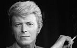David Bowie at a press conference at the 36th Cannes Film Festival in Cannes, France, May 13, 1983 (Ralph Gatti/AFP/Getty Images, via JTA)