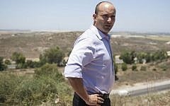 Naftali Bennett on the Israel-Gaza border, on the second day of Operation Protective Edge, July 9, 2014. (Yonatan Sindel/Flash90)