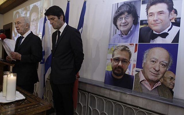 Former Israeli president Shimon Peres (L) and French Ambassador to Israel Patrick Maisonnave seen during a gathering in solidarity with French newspaper Charlie Hebdo at the "Maison de France" in Tel Aviv on January 8, 2015, a day after two gunmen killed 11 people in an Islamist attack at Charlie Hebdo's editorial office in Paris. (Amir Levy/Flash90) Former Israeli president Shimon Peres (L) and French Ambassador to Israel Patrick Maisonnave seen during a gathering in solidarity with French newspaper Charlie Hebdo at the "Maison de France" in Tel Aviv on January 8, 2015, a day after two gunmen killed 11 people in an Islamist attack at Charlie Hebdo's editorial office in Paris. (Amir Levy/Flash90)