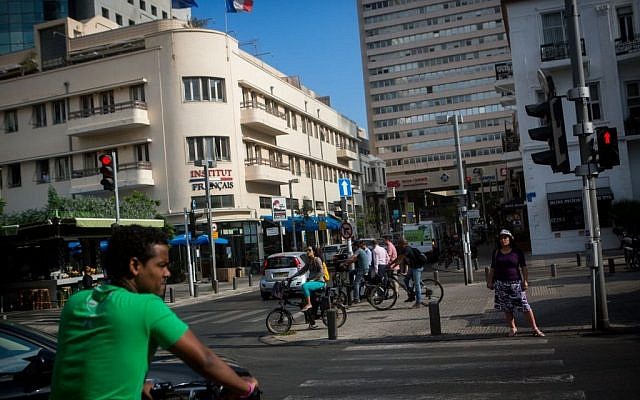 Israelis stand across from the French Institute on Rothschild Boulevard in Tel Aviv on June 15, 2015. (Miriam Alster/Flash 90) Israelis stand across from the French Institute on Rothschild Boulevard in Tel Aviv on June 15, 2015. (Miriam Alster/Flash 90)