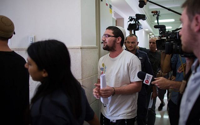 Nachman Tuito, member of the right-wing Lehava organization seen outside the courtroom of the District Court in Jerusalem, July 22, 2015. (Yonatan Sindel/Flash90) Nachman Tuito, member of the right-wing Lehava organization seen outside the courtroom of the District Court in Jerusalem, July 22, 2015. (Yonatan Sindel/Flash90)