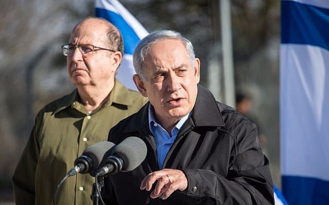Prime Minister Benjamin Netanyahu, right, and Defense Minister Moshe Ya'alon, November 23, 2015. (Emil Salman/Pool) Prime Minister Benjamin Netanyahu, right, and Defense Minister Moshe Ya'alon, November 23, 2015. (Emil Salman/Pool)