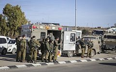 File: Israeli security forces at the scene of a stabbing attack at the Gush Etzion Junction, January 5, 2016. (Gershon Elinson)