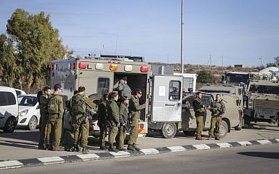 File: Israeli security forces at the scene of a stabbing attack at the Gush Etzion Junction, January 5, 2016. (Gershon Elinson)
