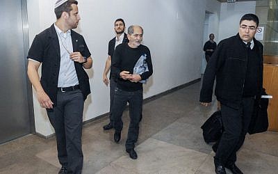 Mohammed Milhem, father of Nashat Milhem, the gunman who killed three Israelis in Tel Aviv on January 1, 2016, walks at the Haifa Magistrates Court after being released from custody on January 10, 2016. Photo by Basel Awidat/Flash90