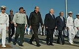 IDF Chief of Staff Gadi Eisenkott, then defense minister Moshe Ya'alon, President Reuven Rivlin and Prime Minister Benjamin Netanyahu at a welcoming ceremony for the new submarine 'Rahav' at the Israeli navy base in Haifa, on January 12, 2016. (Kobi Gideon/GPO)