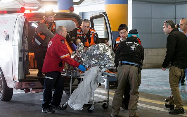Medics wheel a wounded Michal Forman into the emergency room of the Shaare Zedek Medical Center on January 18, 2016. Froman, who is pregnant, was wounded in a stabbing attack in the settlement of Tekoa (Yonatan Sindel/Flash90) Medics wheel a wounded Michal Forman into the emergency room of the Shaare Zedek Medical Center on January 18, 2016. Froman, who is pregnant, was wounded in a stabbing attack in the settlement of Tekoa (Yonatan Sindel/Flash90)