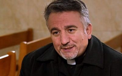 Father Douglas Al-Bazi in his Mar Elia Chaldean Catholic Church in Erbil, Iraq. (screenshot)