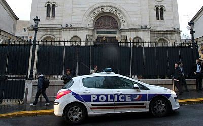 Illustrative. Police guard a synagogue during a visit by French Interior Minister Bernard Cazeneuve, in Marseille, southern France, January 14, 2016. (AP Photo/Claude Paris)