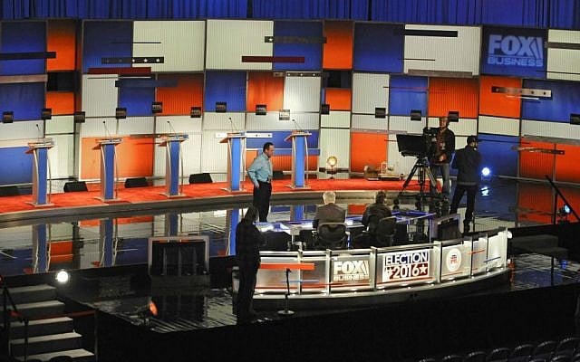 Crew members set the stage at the North Charleston Coliseum, Wednesday, Jan. 13, 2016, in North Charleston, South Carolina, in advance of Thursday's Fox Business Network Republican presidential debate. (AP Photo/Rainier Ehrhardt) Crew members set the stage at the North Charleston Coliseum, Wednesday, Jan. 13, 2016, in North Charleston, South Carolina, in advance of Thursday's Fox Business Network Republican presidential debate. (AP Photo/Rainier Ehrhardt)