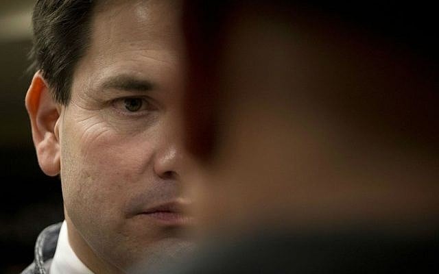 Republican presidential candidate, Sen. Marco Rubio, R-Florida, listens to a supporter while greeting the crowd after a rally Saturday, Jan. 30, 2016, in Council Bluffs, Iowa. (AP Photo/Jae C. Hong)
