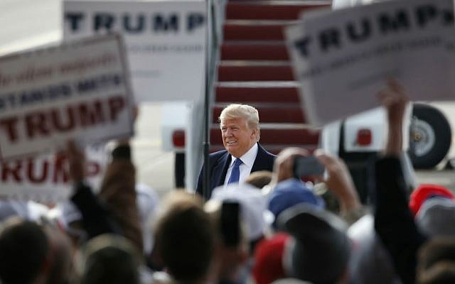 Republican presidential candidate Donald Trump appears during a campaign event at Dubuque Regional Airport, Saturday, Jan. 30, 2016 in Dubuque, Iowa. (AP Photo/Paul Sancya)