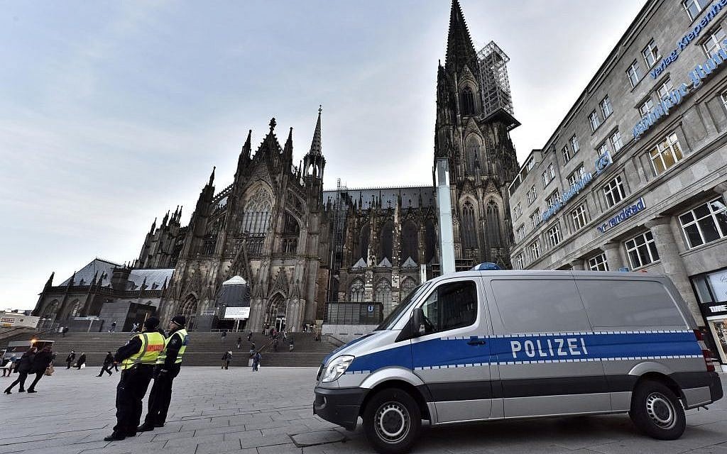 Police patrol in front of the main train station and the cathedral in Cologne, Germany, Monday, January 18, 2016. (AP Photo/Martin Meissner)